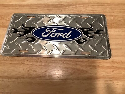 Collectible Licensed Ford Flame Tire tread Vehicle License Plate 3 Years Old