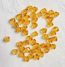 49 Pcs Swarovski Crystal Bicone Beads 5328 Xilion Light Topaz, 6mm