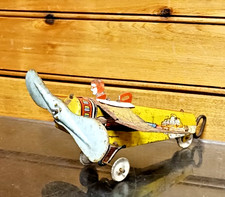 VTG Unique Art Tin Windup Sky Raiders Airplane- RARE