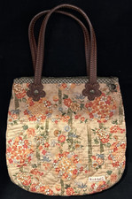 Kookkai Quilted Lined Handbag with Leather Handles and Metal Hardware