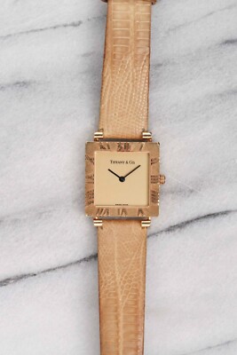 Vintage Tiffany & Co Atlas 80s 18K Yellow Gold Champagne Dial Quartz 25mm Case.