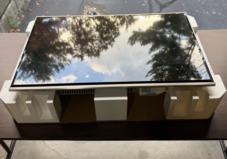 "Placa de inducción de transición Wolf 30"" CI304T/S - vidrio negro con borde de acero inoxidable" Foto 4 de 4