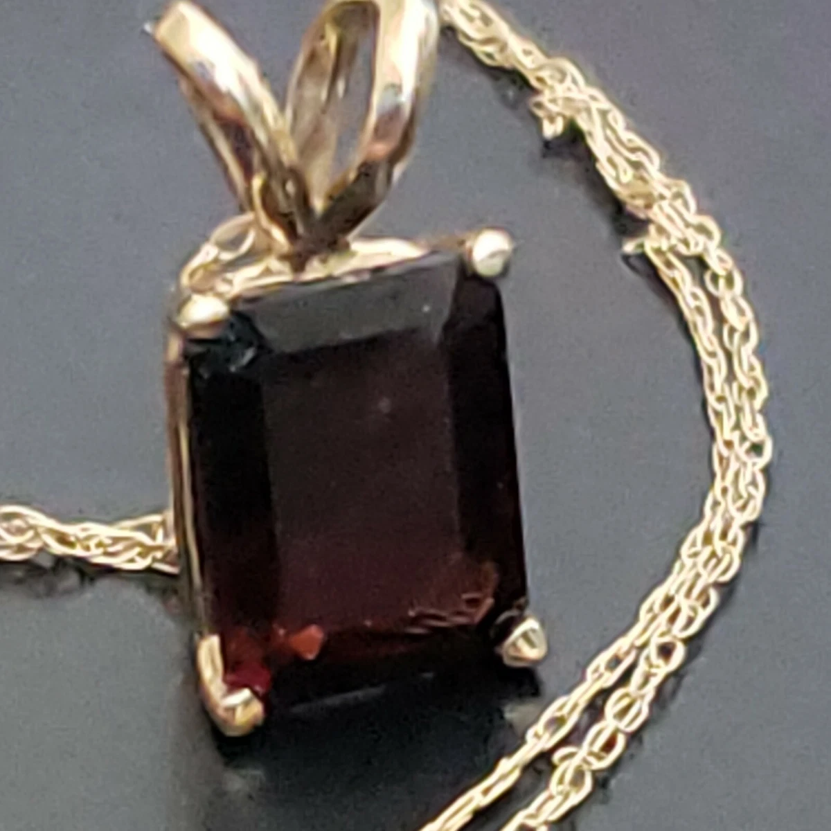 Emerald and garnet best sale necklace