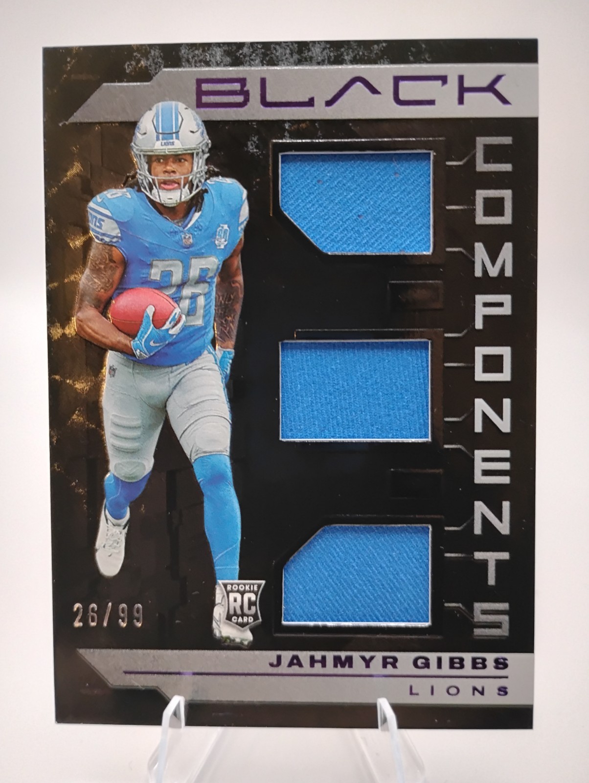 Jahmyr Gibbs Panini Black Components Relics #COM5 Royal
