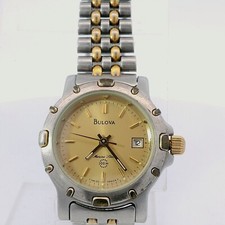 Vintage Ladies Bulova 98M24 Marine Star 100M Two Tone Stainless Gold Dial Watch