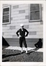 WW2 Photo Of US Navy Sailor Hands On Hips By Wooden Barracks Wall