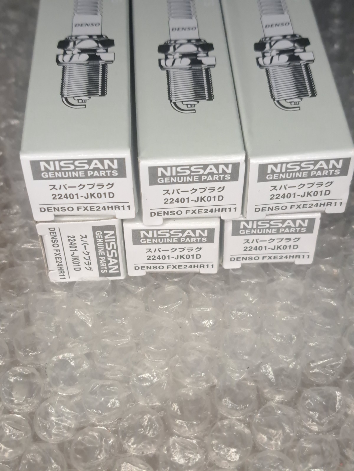Spark Plugs. Nissan 22401-JK01D. Original.