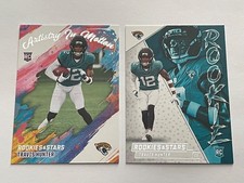 (2) 2025 Rookies & Stars Travis Hunter #8 Artistry In Motion + Rookie Exclusive