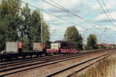 FOTO GÜTERZUG NÖRDLICH VON SANDY DIE EW&S LOK FÄHRT NACH NORDEN MIT LEEREN WAGGONS.