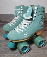 candi girl roller skates size 4 Never wore siede teal clear wheels some marks