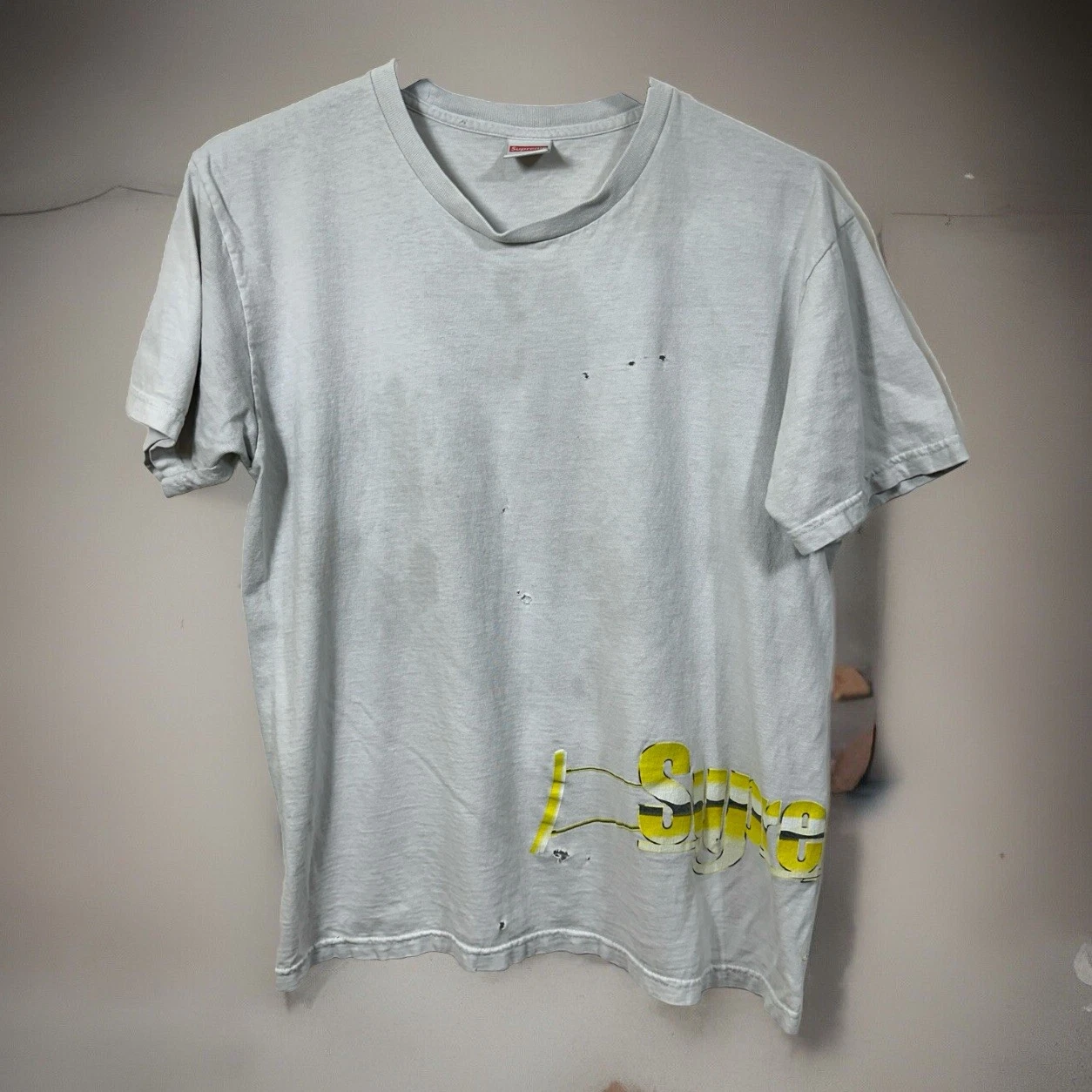 T shirt graphique Distressed Supreme Gold Machine Gun grand 100% coton streetwear