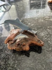 John Perry art piece made of resin. There are two dolphins newest tags.