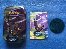 Pokémon Mimi Tin vuota di Umbreon + moneta Cyan Eevee e carta illustrata. Ita.