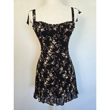 Reformation Christine Black Floral Mini Dress Sz 4 — Ruffled Hem & Tie Straps