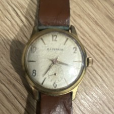 OJ Perrin montre ancienne mécanique manuelle