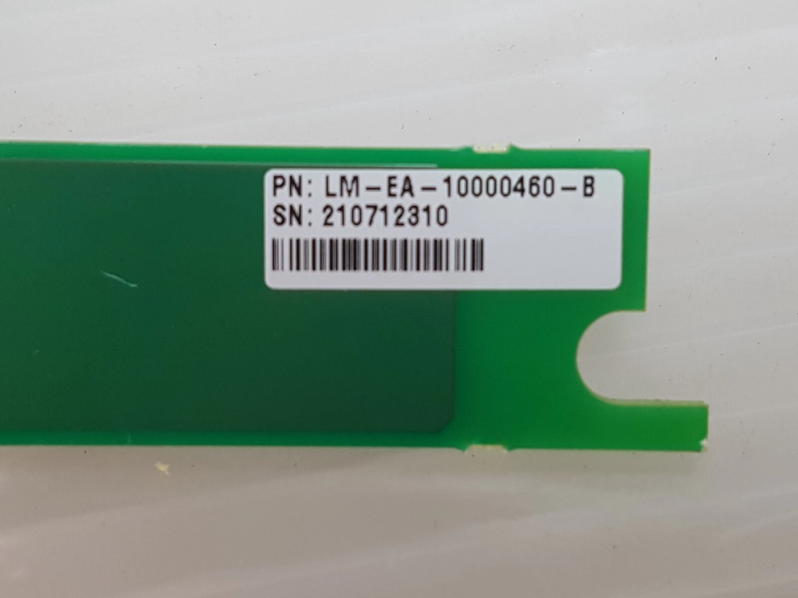 Close-up of the LM-EA-10000460-B part-number label on the attenuator board