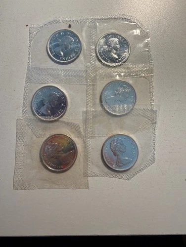 6-1964-1967 80% SILVER CANADIAN QUARTERS