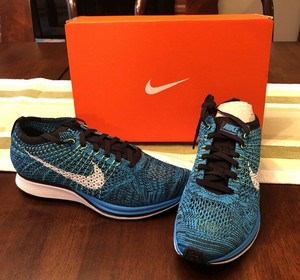 nike flyknit racer blue red