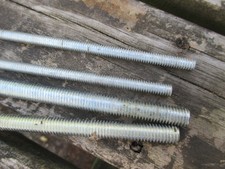 Threaded steel rods- unused 4 pieces, assorted lengths unused