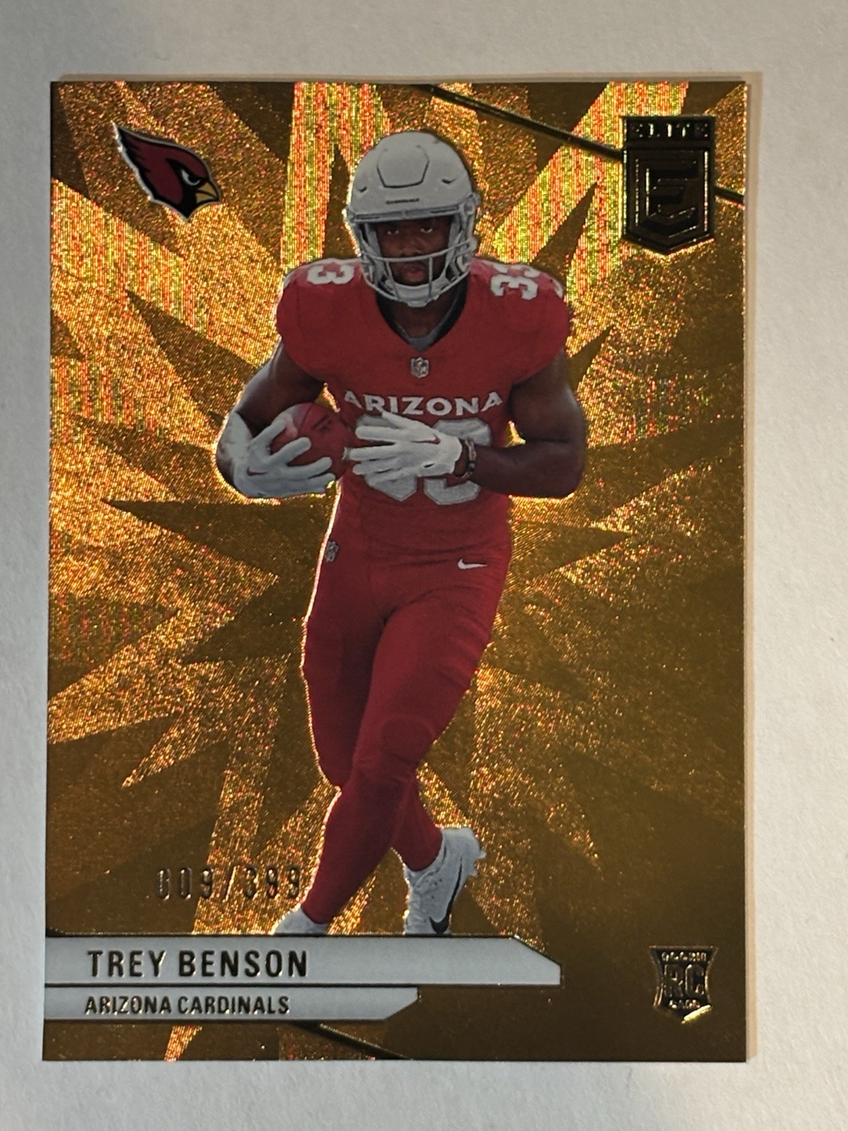 2024 Elite Orange #124 Trey Benson Rookie Serial /399 Cardinals