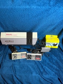 Nes console with 11 games metriod and more