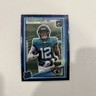 2025 Panini  Optic - Rated Rookie Travis Hunter #201 Purple Shock Prizm (RC)