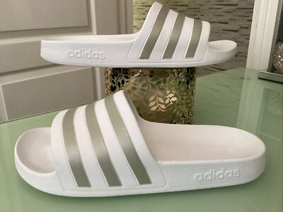 white adidas sliders