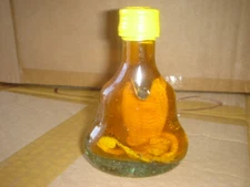 real cobra snake in a small X O glass bottle 4" tall