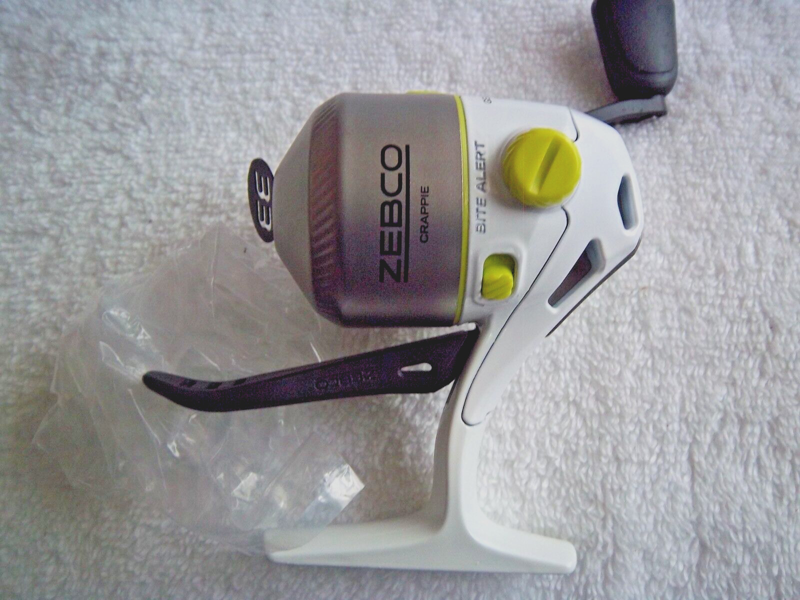 ZEBCO CRAPPIE 33 MICRO 4.3:1 GEAR TRIGGER SPIN REEL, IT HAS NO BOX 21-41476
