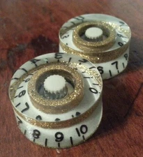 2 Guitar speed volume/tone knobs. Glow In The Dark / Gold Flake..   JAT