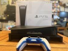 Sony PlayStation 5 Console Black with 2 DualSense Controllers and charger.