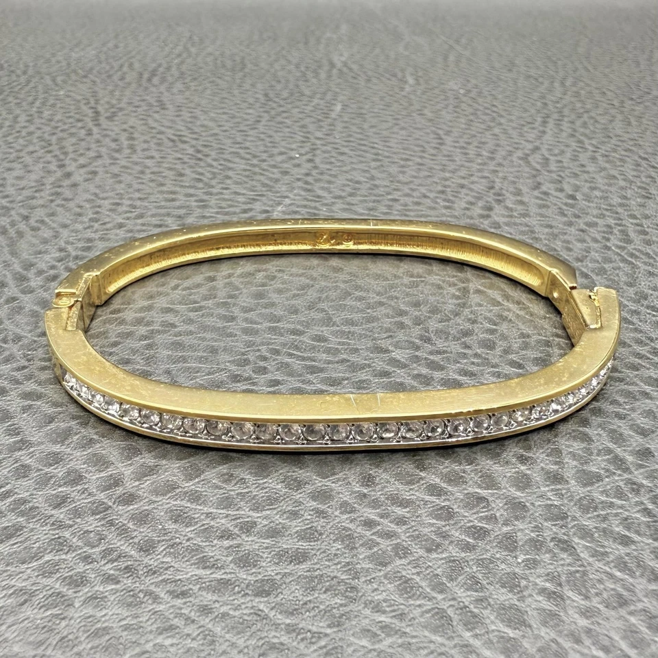 Brazalete Brazalete Swarovski Tono Dorado Ovalado Bisagras Cristales Transparentes Logo Cisne 7.5" Foto 2 de 4