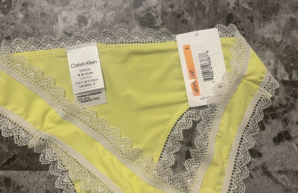 BRAGAS TANGA FINAS CALVIN KLEIN PEQUEÑAS LISAS AMARILLAS ENCAJE NUEVAS CON ETIQUETAS Foto 4 de 4