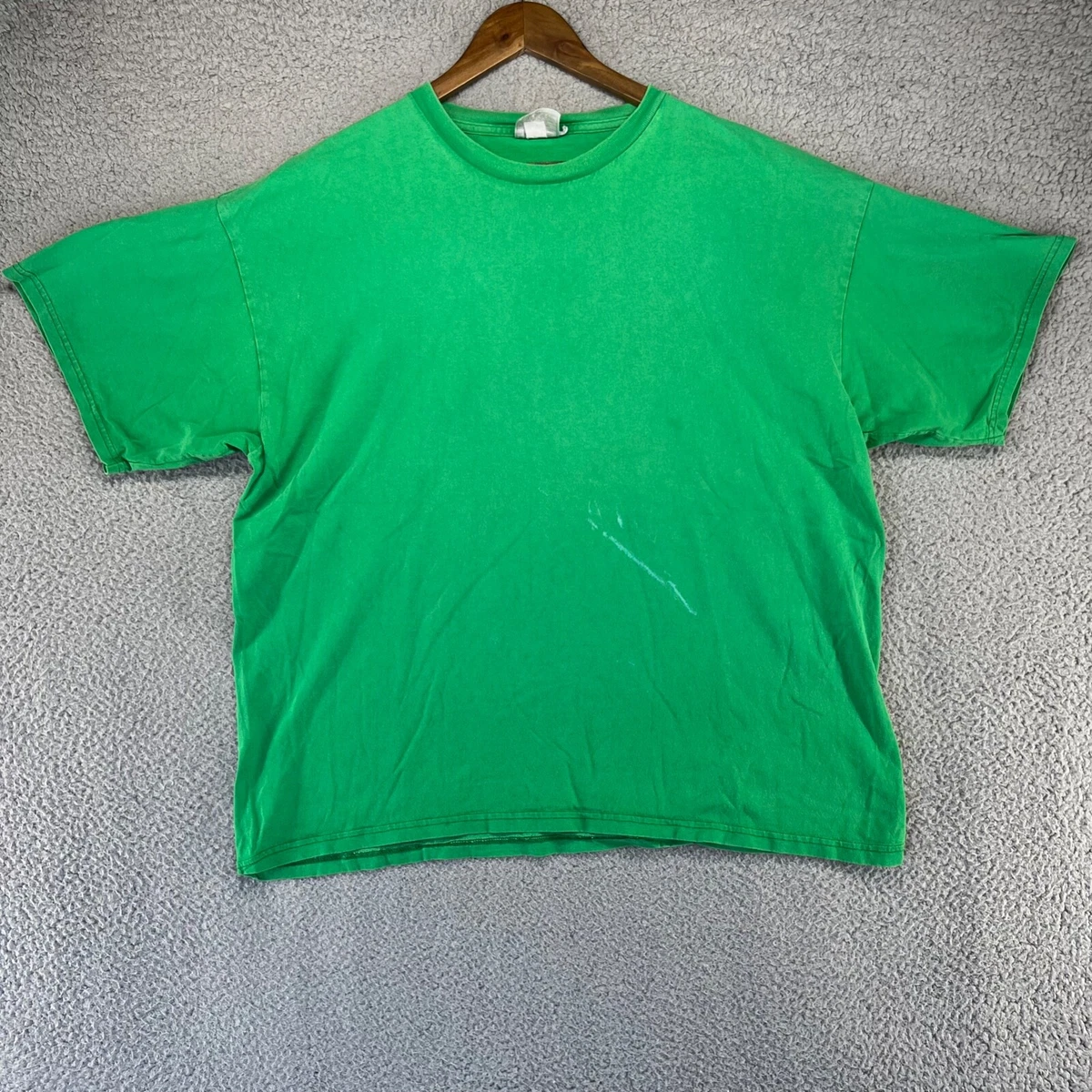 Faded green store shirt