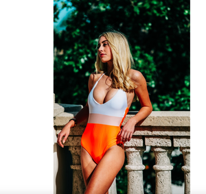 orange and white bathing suit
