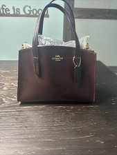 Borsa a tracolla Coach 25137 Charlie Carryall sangue di bue pelle ciottolata uso leggero