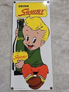 Drink Squirt Porcelain Enameled Advertising Sign 1986 USA 14"X6" Ande Rooney