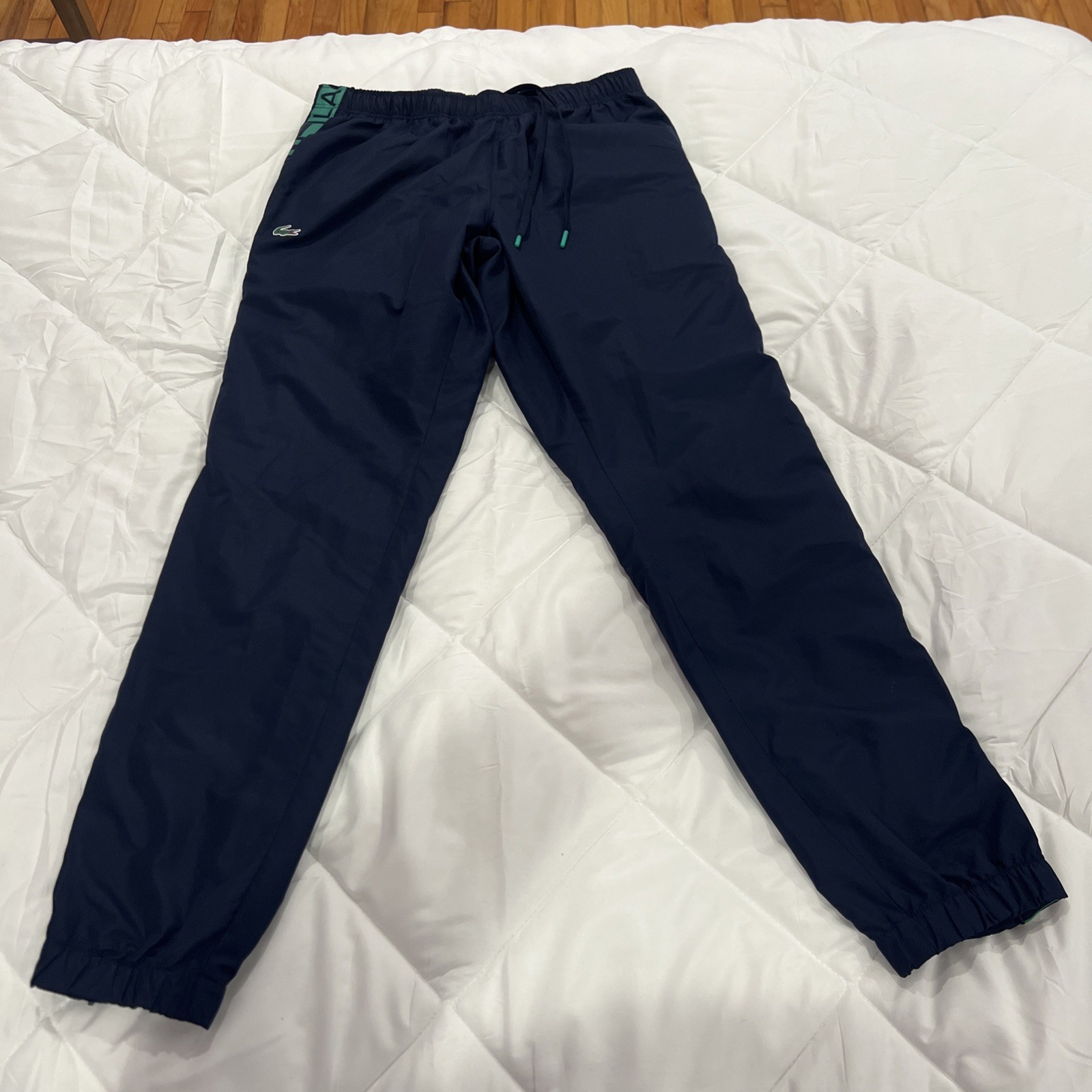 Lacoste Sport track pants navy blue with neon green logo tape sz M 4