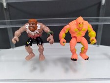 Fisher Price Imaginext Dinosaurios Lote de 2 Figuras Hombre de las Cavernas y Destripador Spinosaurus