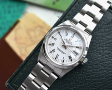 Rolex Oyster Perpetual Date 15200 Box and Papers 34mm White Roman Numeral Dial