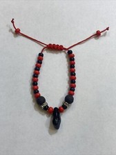 AZABACHE RED BRACELET WITH RED EVIL EYE BABY /PULSERA AZABACHE PARA BEBE-black