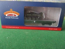BACHMANN WARFLAT BOGIE FLAT WAGON WD BRONZE GREEN WITH TANK. CAT NO.38-726