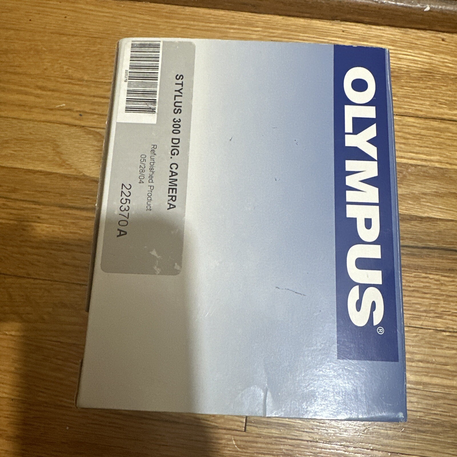 Olympus Stylus 300 Digital 3.2MP Digital Camera Bundle, Remote Charger