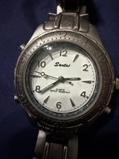 This is a Philip Persio titanium analog watch with a white Face