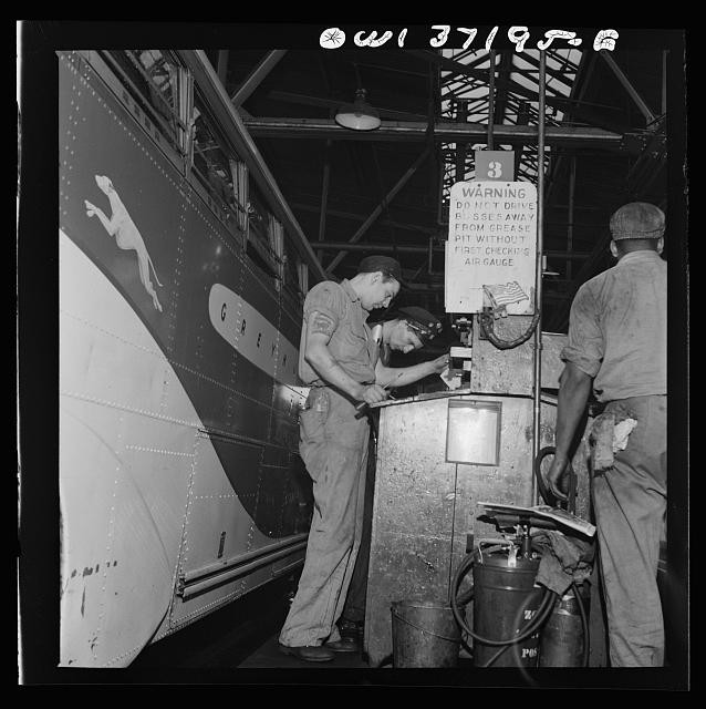Getting ready to gas a bus at the Greyhound garage. Pittsburgh, Pennsylvania