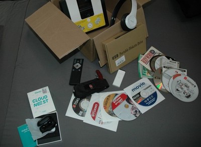 Box of Stuff: Bluetooth earbuds, headphone; SONY DVR recorder, Apple remote, etc