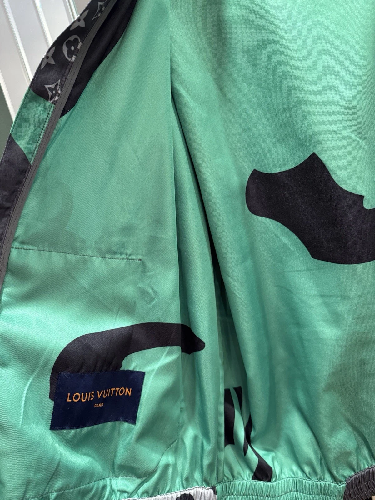 LOUIS VUITTON（LV） Giacca a vento Louis Vuitton X KidSuper FW23 ritratto patchwork con cappuccio 50