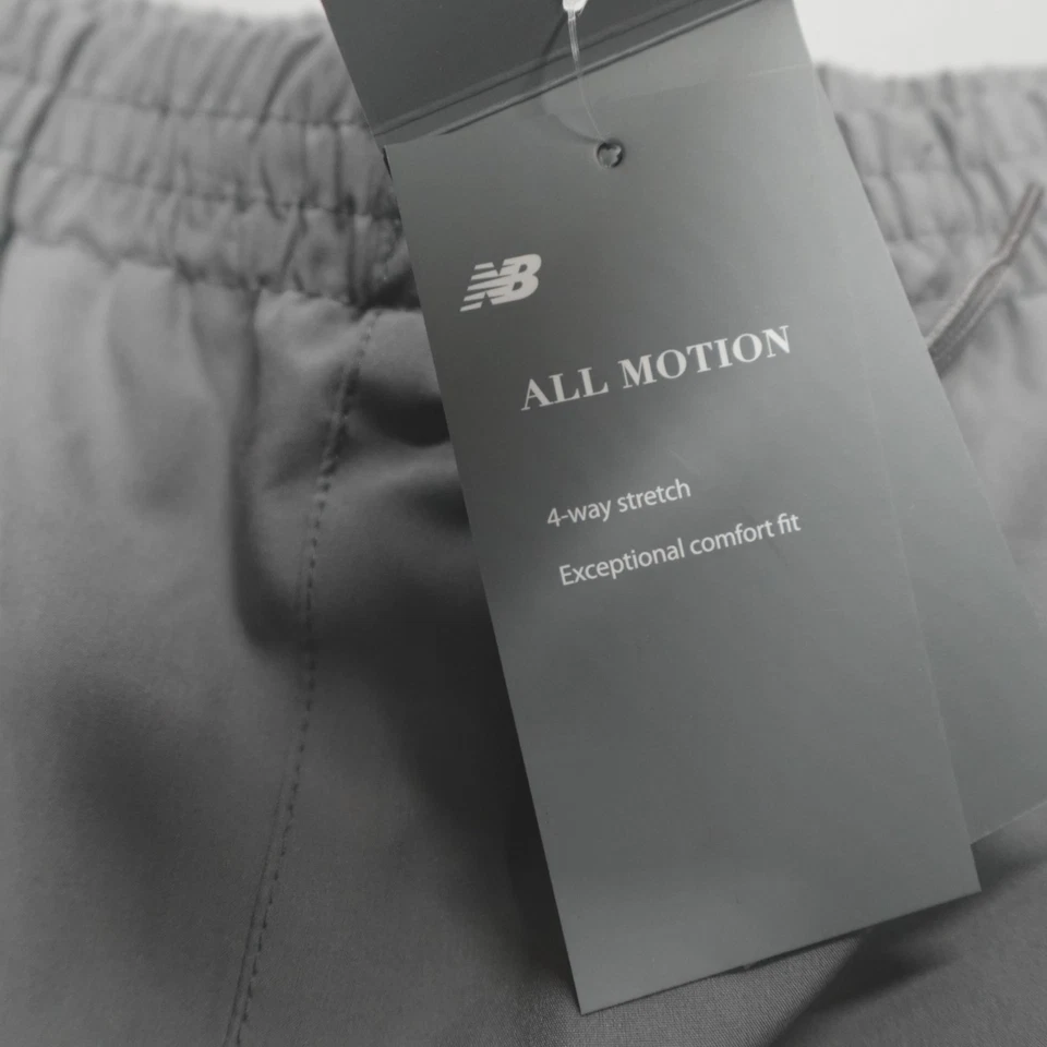 Pantalones de correr New Balance All Motion para hombre talla M gris forrados de malla cremallera al tobillo Foto 3 de 4