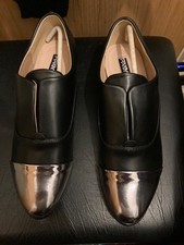 BN black court slip on style shoe, with silver toe cap & low heel size 7 uk