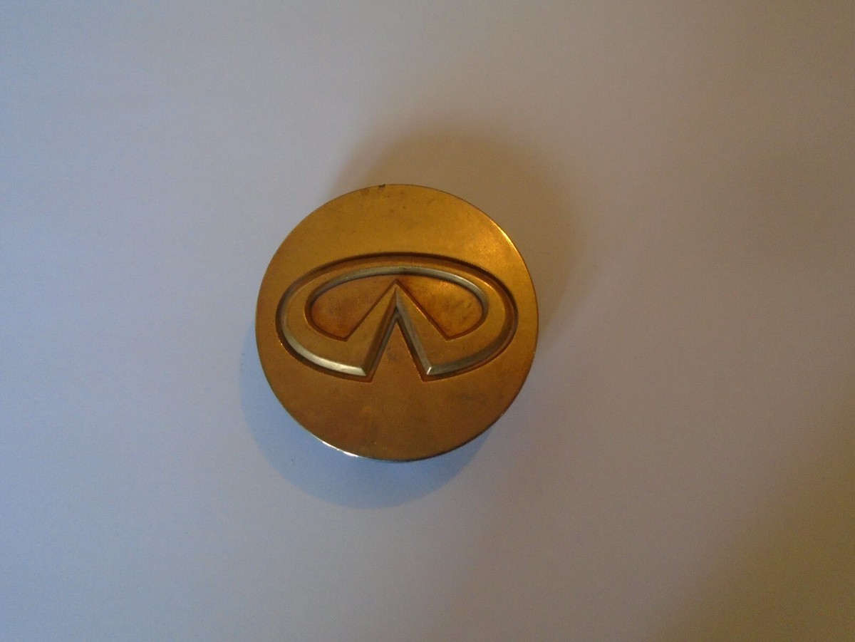 NISSAN 40343 5P215 OEM Center Wheel Hub Cap gold in color